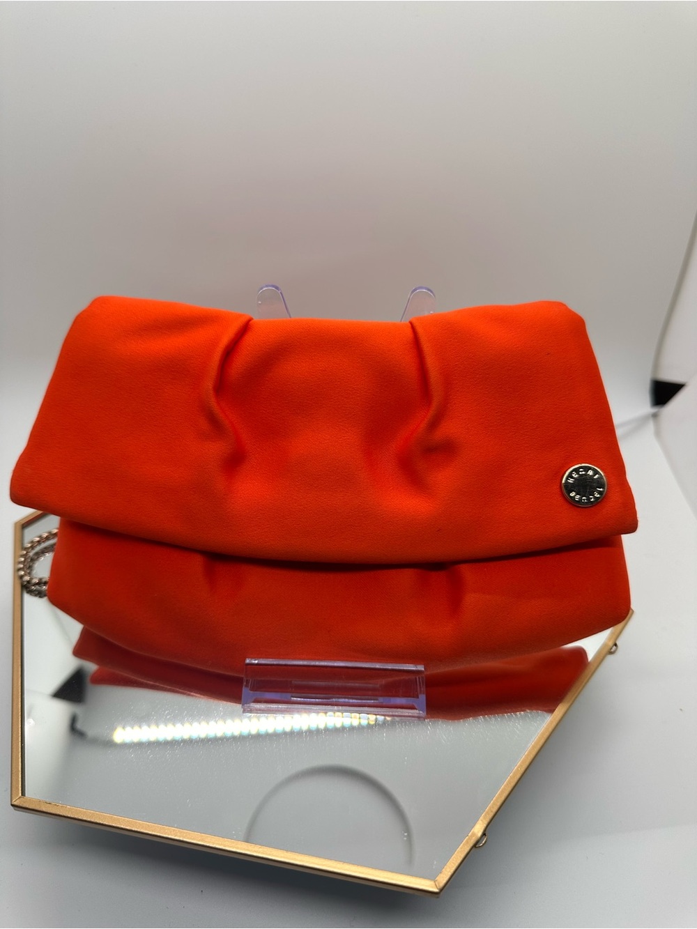henri bendel Orange Fold-Top Wristlet with Metal Accent